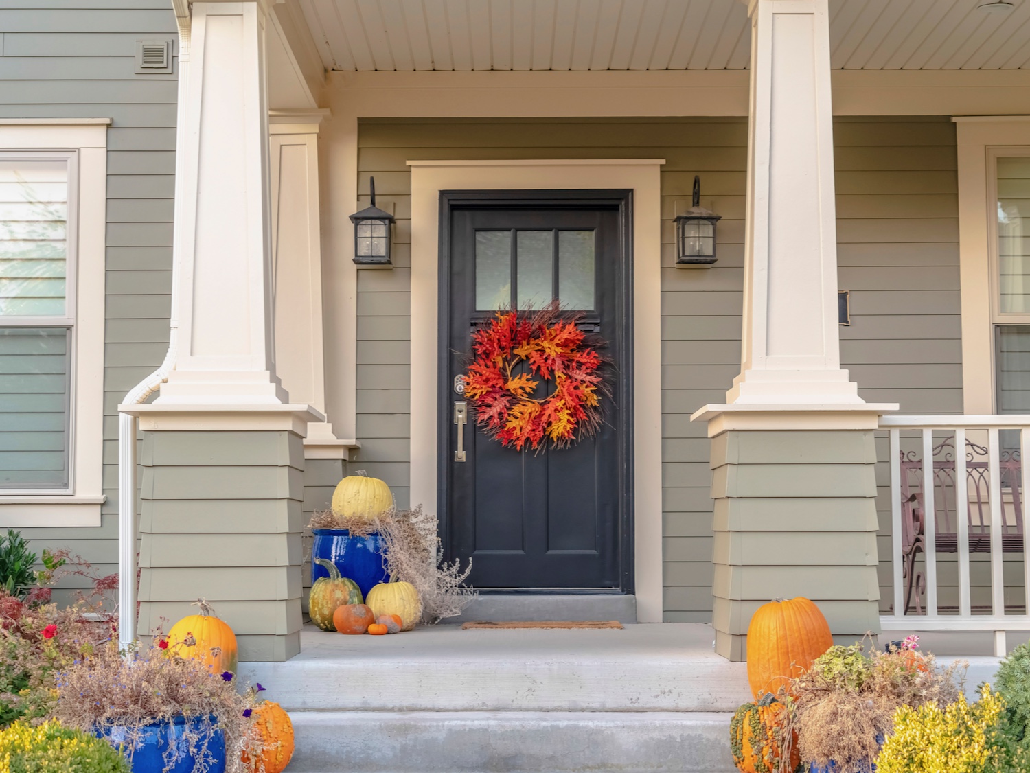 Colorful autumn wreath hanging on a front door