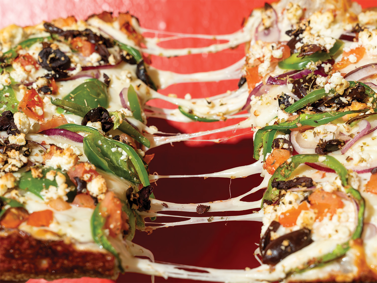 BR_HighDough_StretchingCheesePizza Slices