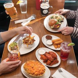 BR_NextAct_VarietyOfPubFoodOnWoodenTable