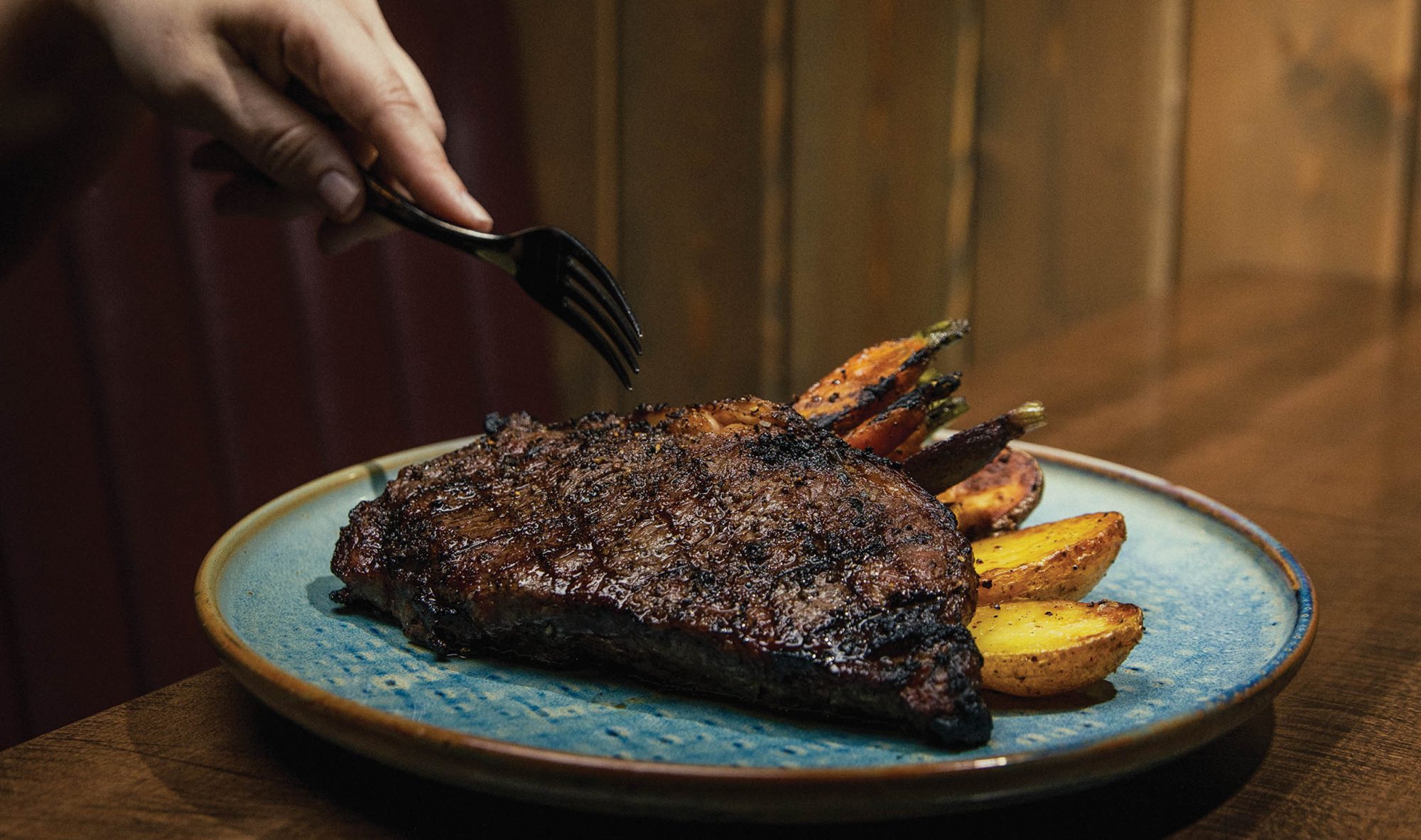 Barbacoa_SteakOnBluePlateWithSides