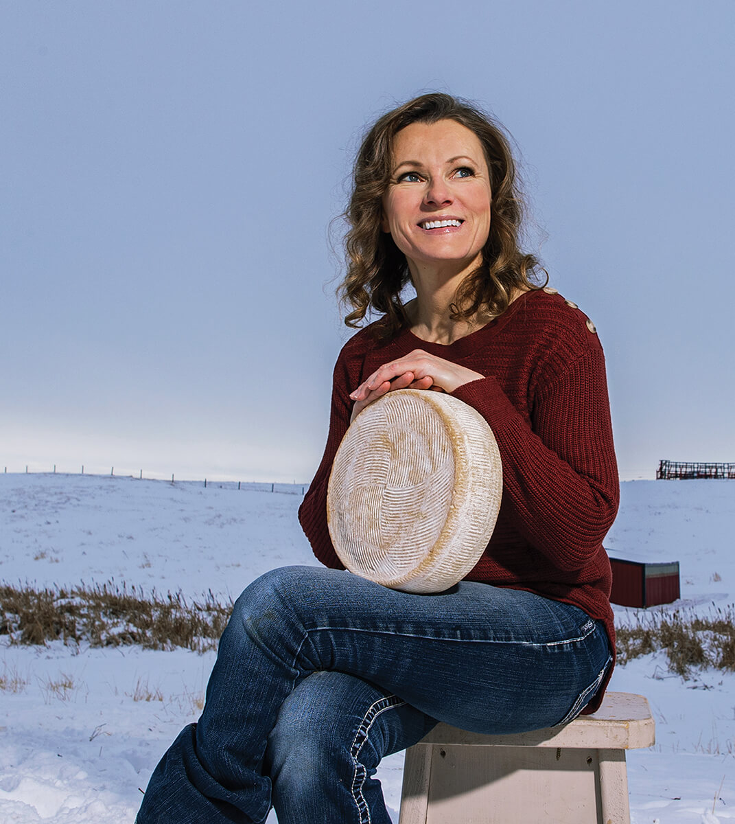 Cheesiry_RhondaZukHeadon_SittingWithRoundOfCheese