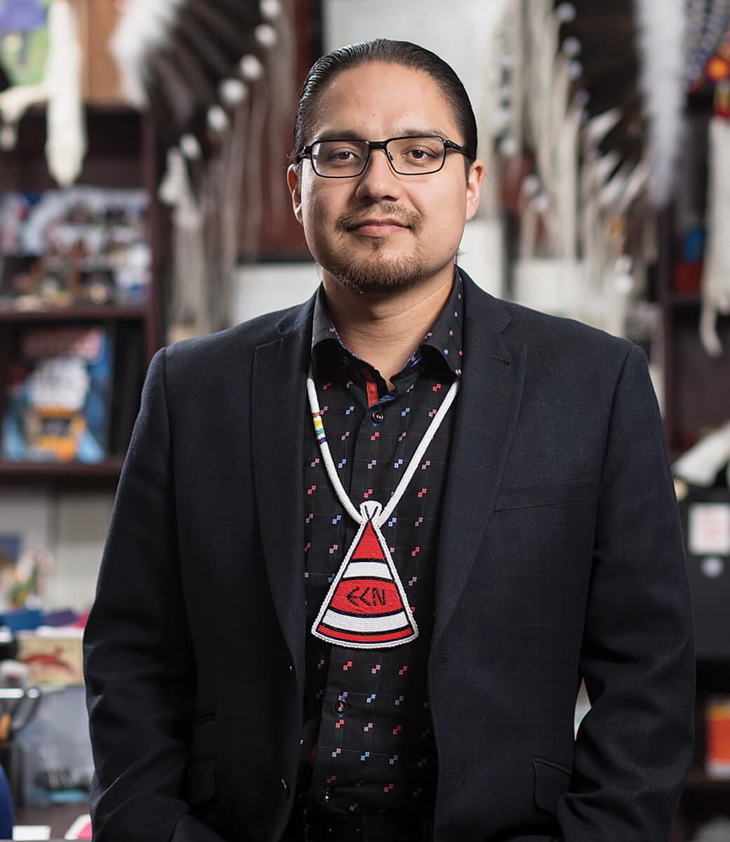 ChiefBilly_InFrontOfShelving_IndigenousPieces