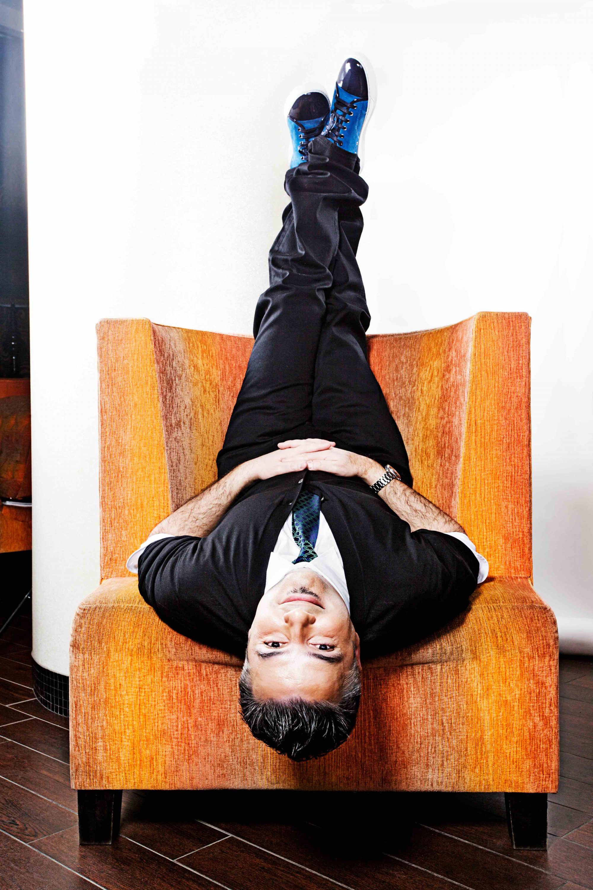 Hugo Boss Jeans, $185, Giorgio Armani shirt, $275, Prada cardigan, $780, Eton tie, $125, Lanvin sneakers, $475, all from Henry Singer.