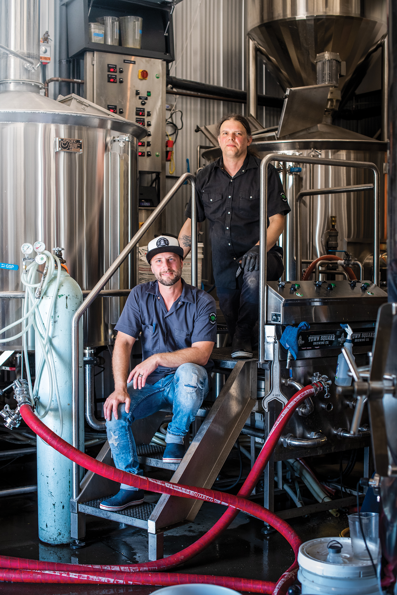 Delicious_TownSquareBrewing_NikKozub_BrandonBoutin_InFrontofVat