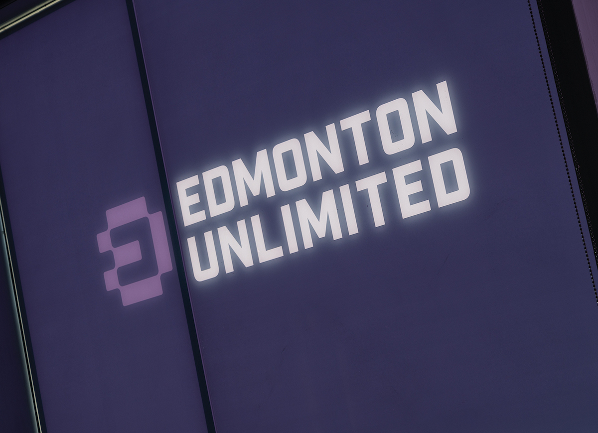 Edmonton_Unlimited-ReversedLogoOnWindow