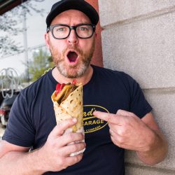 Chris Craddock with a Beef Burrito from El Rancho Spanish Restaurant