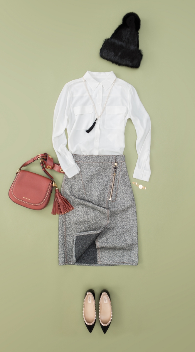 Michael tuque, $495, from Michael Kors; Equipment shirt, $230, from Holt Renfrew; Acne skirt, $230, from Holt Renfrew; Michael purse, $428, from Michael Kors; Karen Kordic necklace, $240 from Who Cares? Wear; Luj bracelet, $370, from Simons