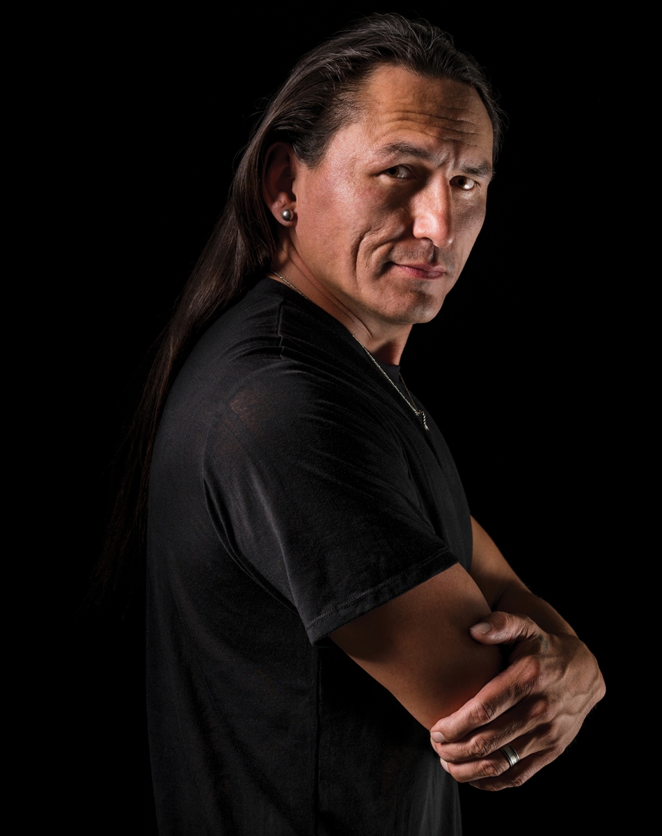 Eugene Brave Rock, arms folded