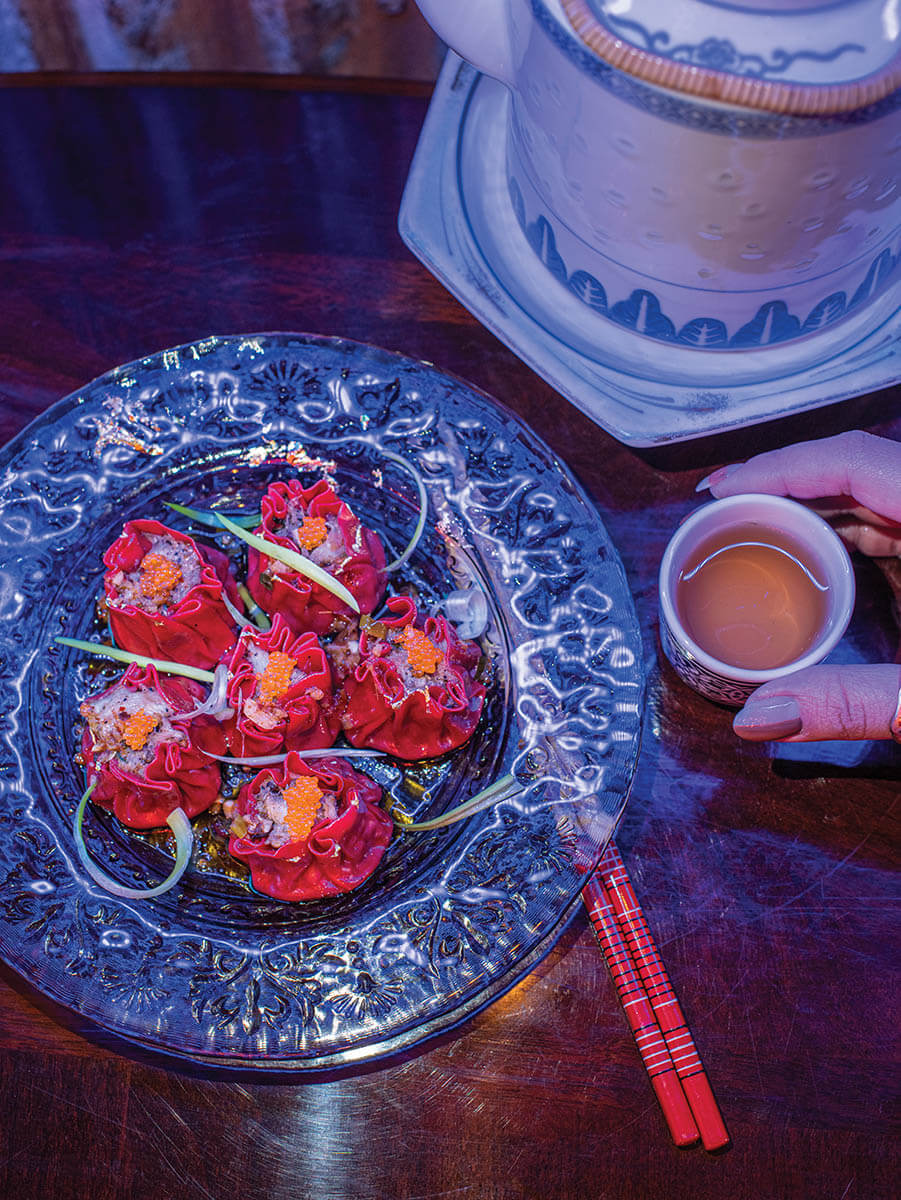 FUs Siu Mai Dumplings Clear GlassPlate Red Chopsticks Tea Pot Blue Red
