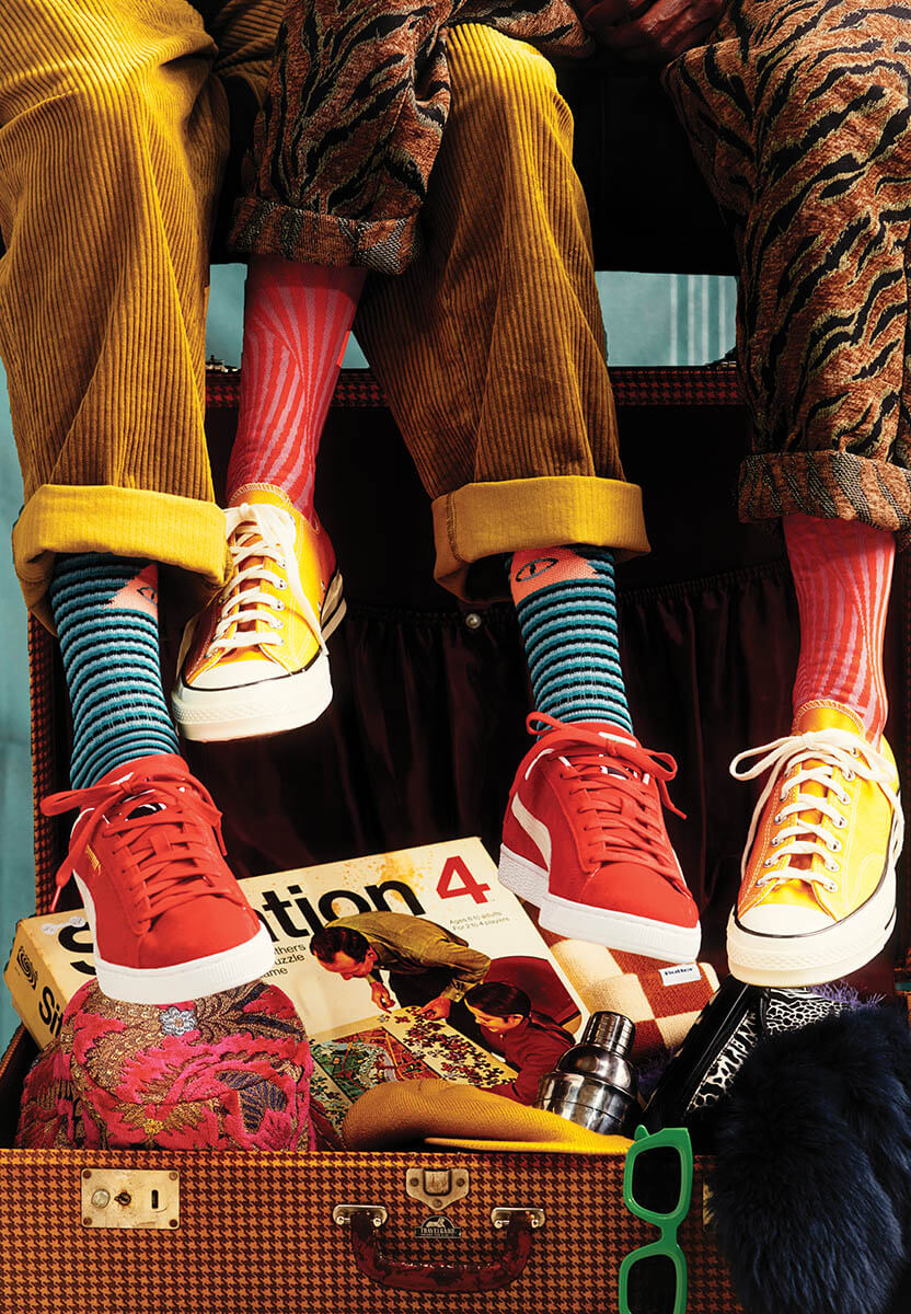 FallFashion_4Legs_2RedRunners_2YellowRunners_MustardCords_PrintCords_BlueStripedSocks_VintageSuitcaseOpenWithHats