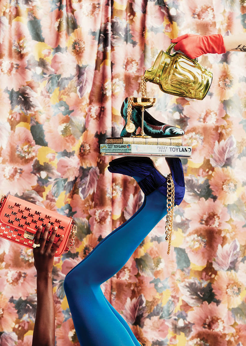 FallFashion_BlueLegsAndShoesUp_CoralClutch_GoldPitcherPouringInShoe