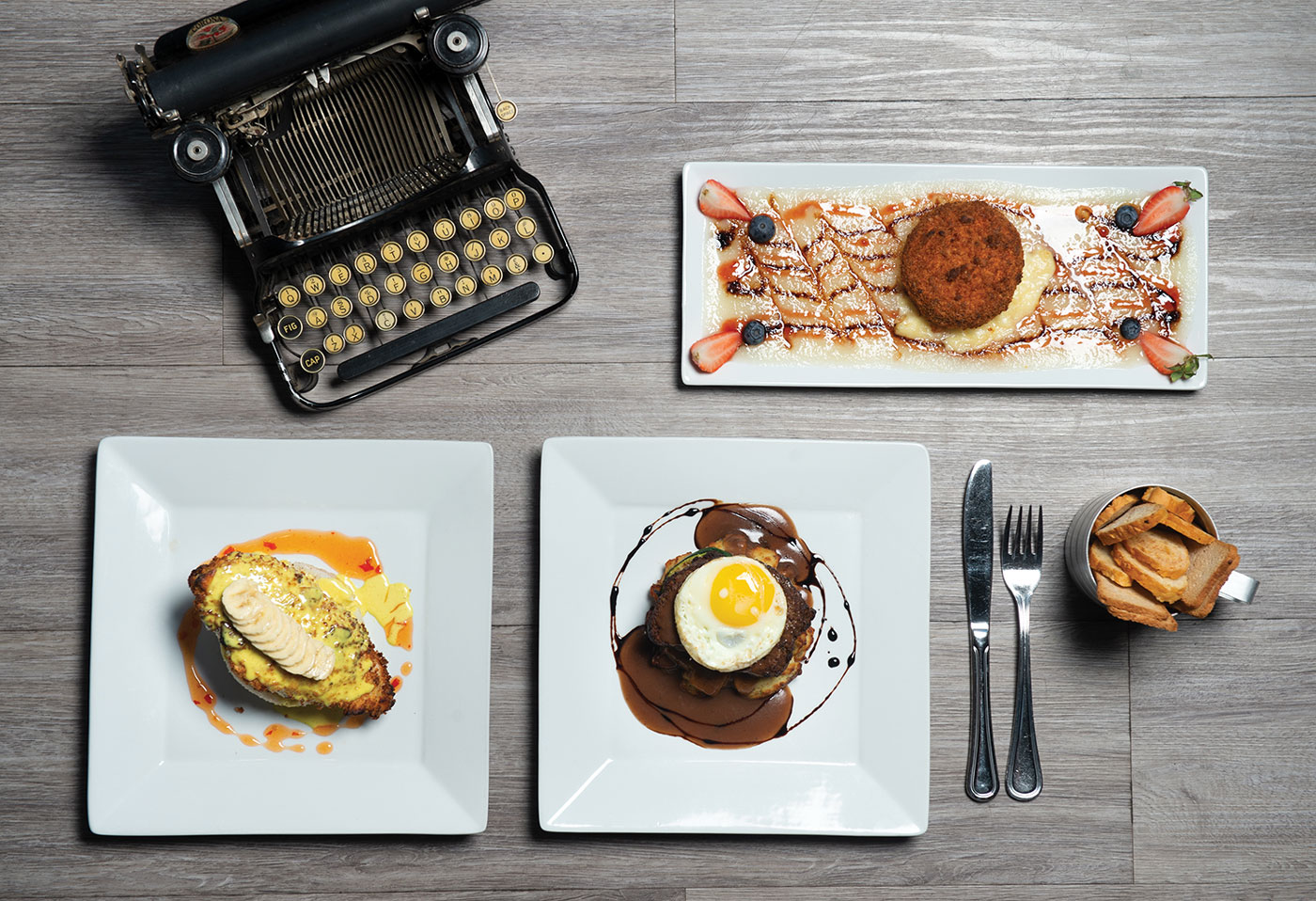 Banana chip air fried chicken breast, Hemingway's Meatloaf and Macadamia Crusted Brie.