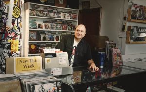 Rich Liukko behind the counter at Freecloud Records