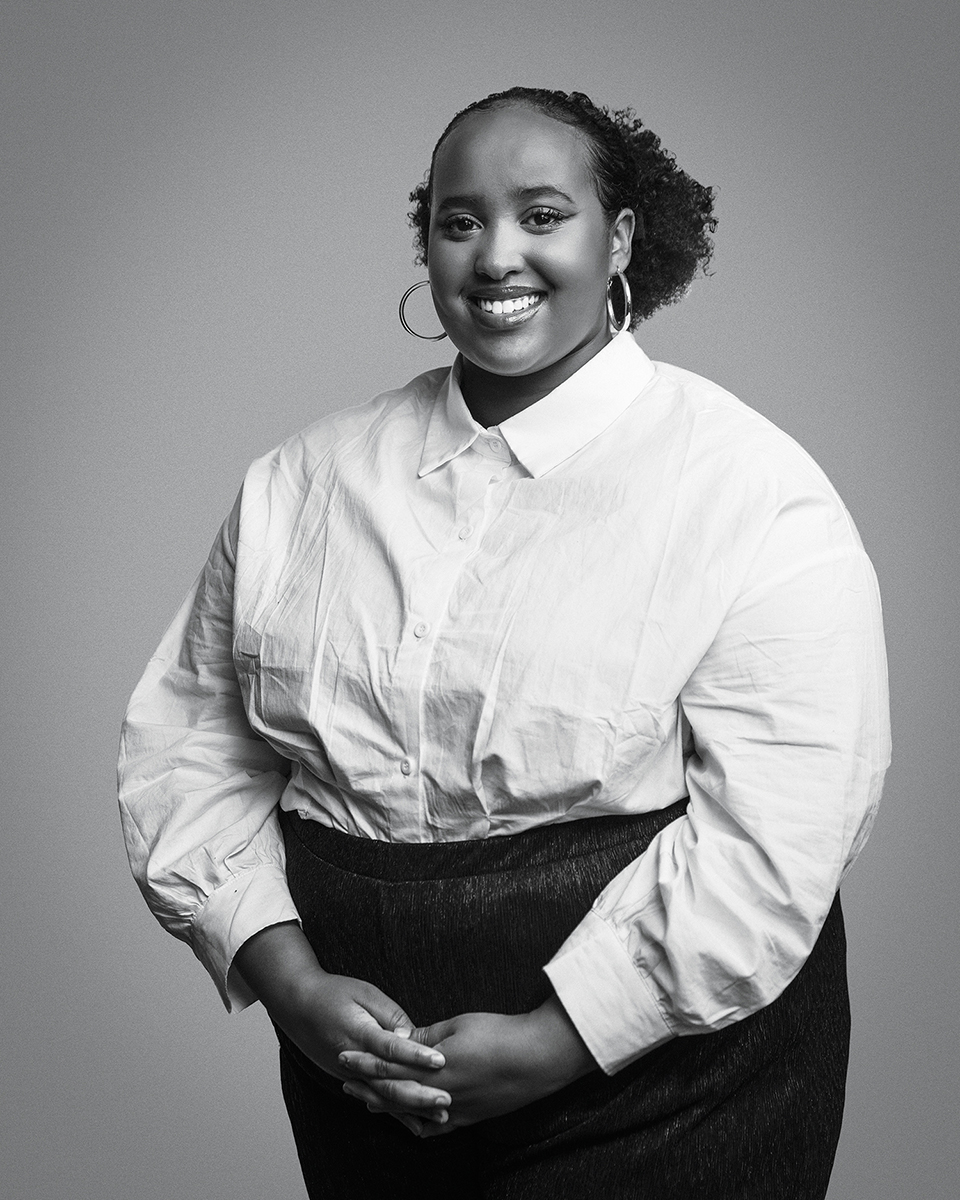 IFSSA_TimiroMohamed_Standing_HandsInFront_Cropped_BW