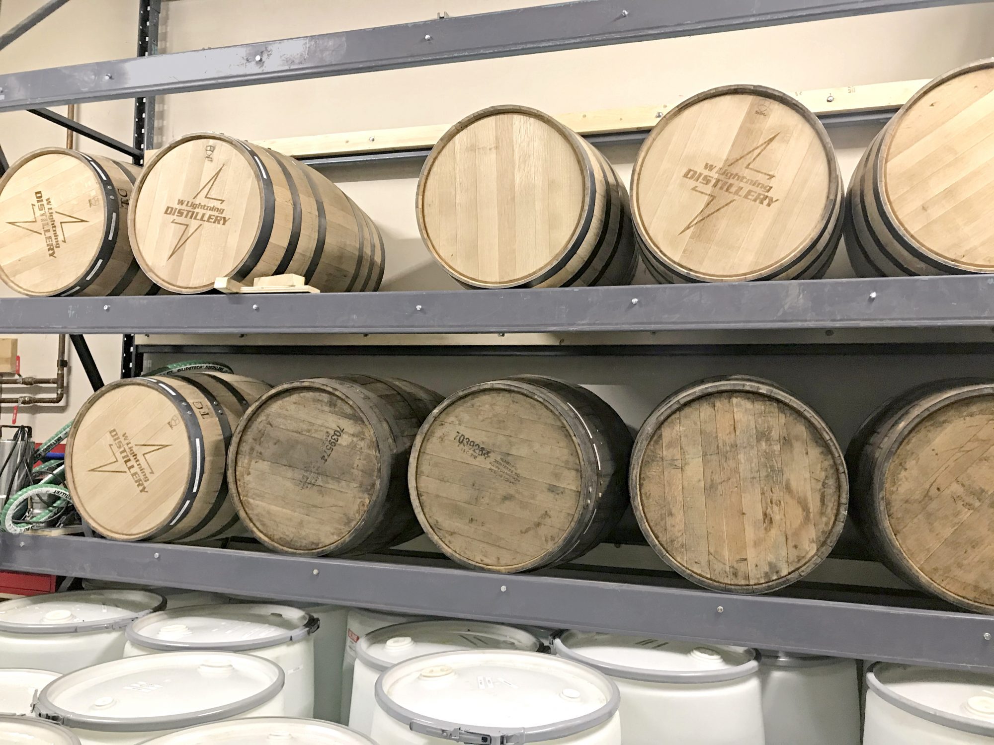 Whiskey barrels at White Lightning Distillery