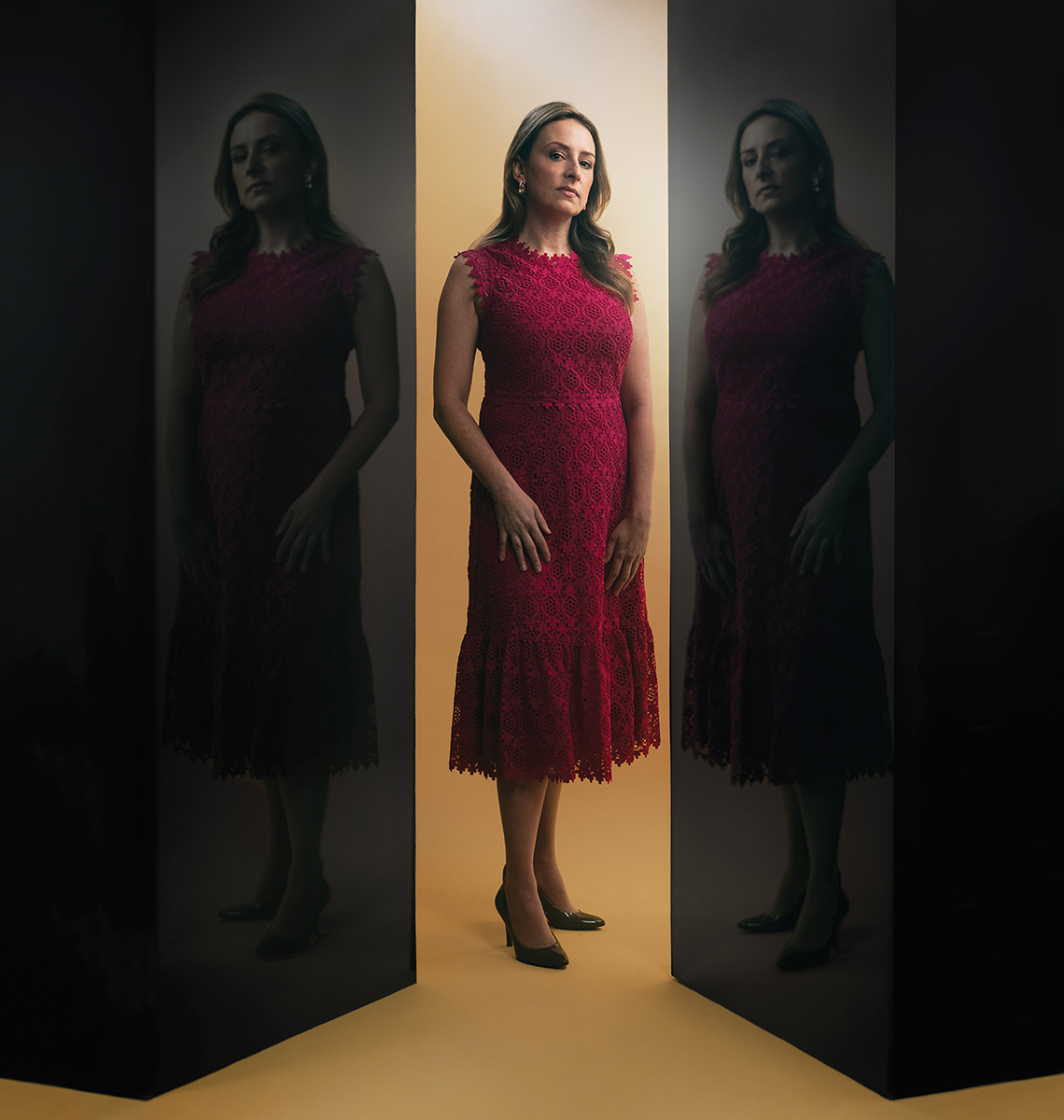 KaseyMachin_Standing_wReflectionOnBlackWall