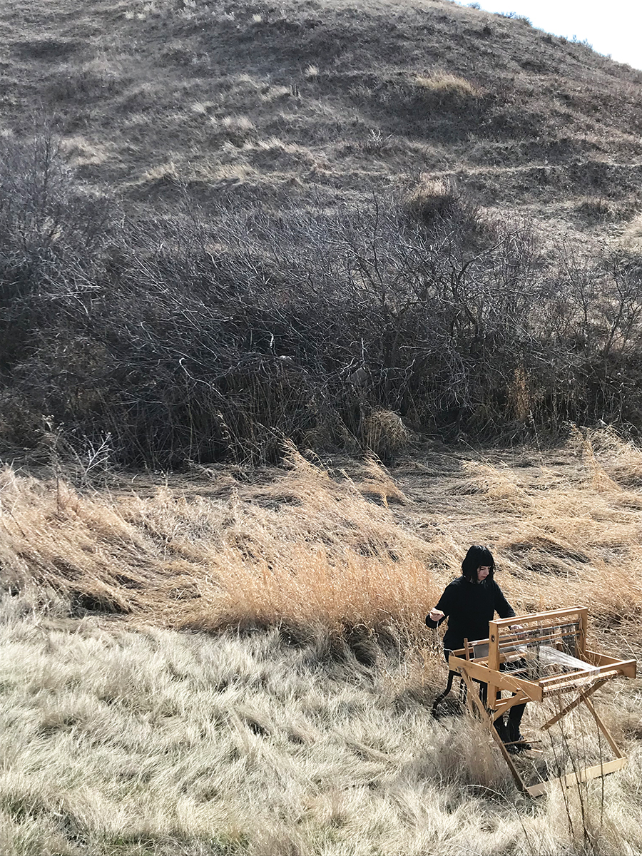 KellyRuth_WeavingOnLoomInWild