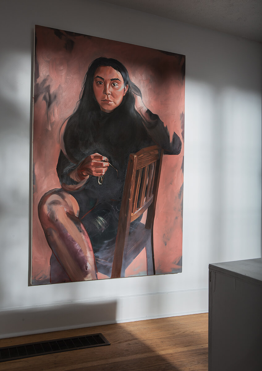 LargePortrait_WomanSidwaysSittingOnChair