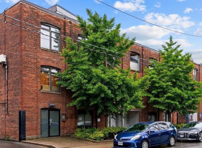 Second Property of the Week: Big Brick Building in the Big City