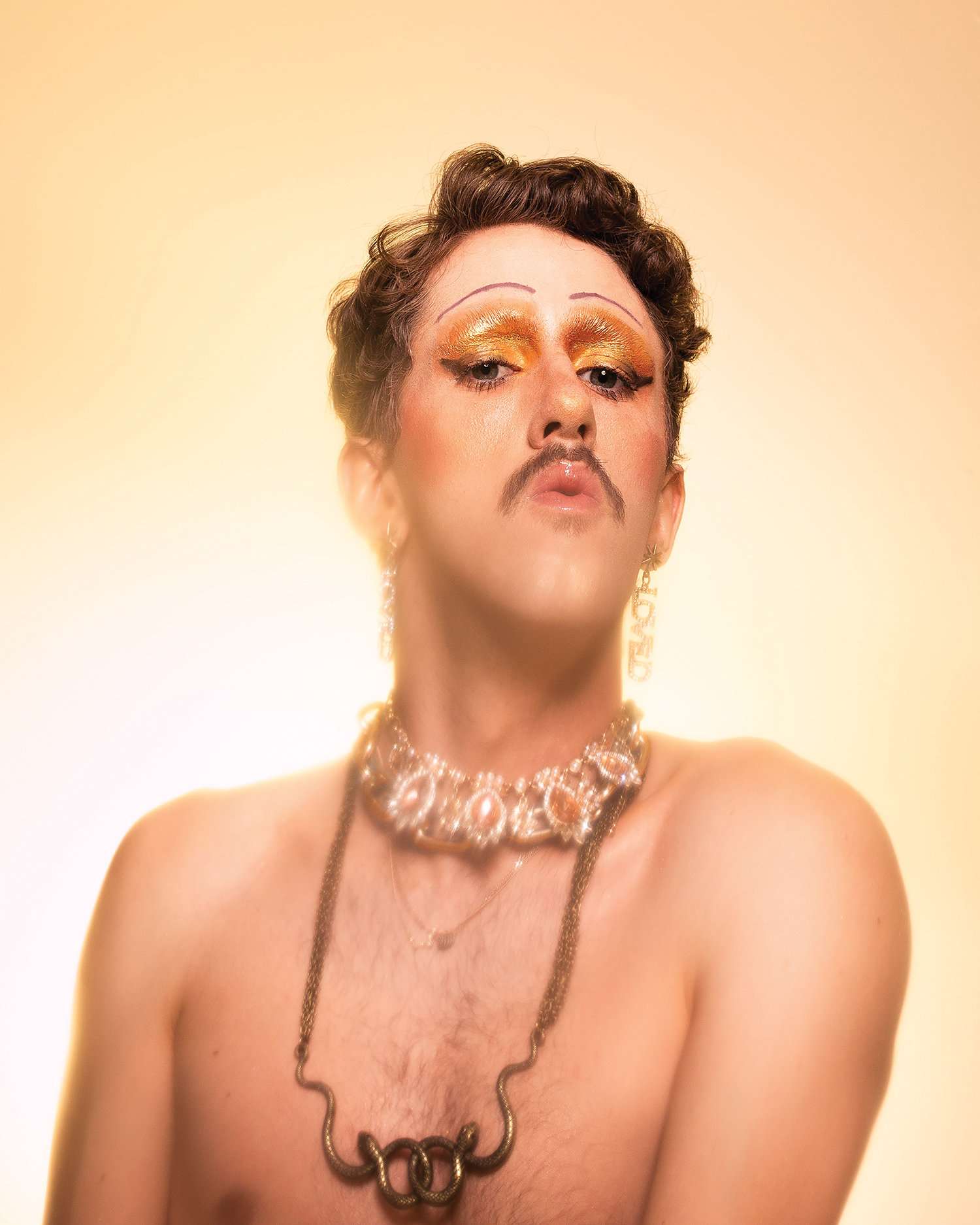 MackenzieLiam_Drag_SparklyGoldEyeshadow_moustache_jewellery