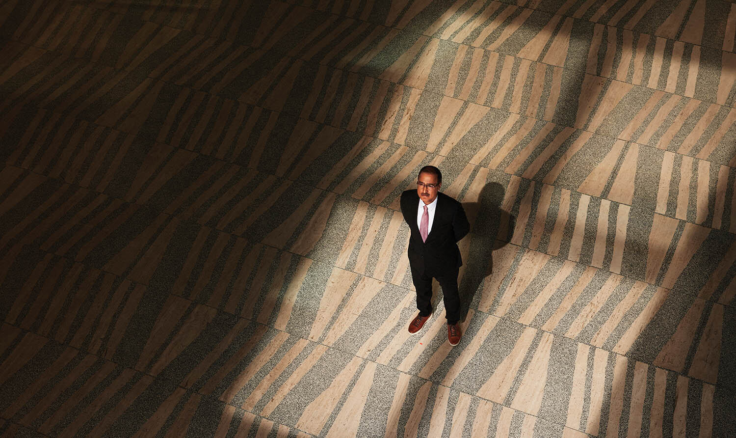 MayorSohi_Standing_LookingUp_ShotAbove_MarbleFloor_Shadows