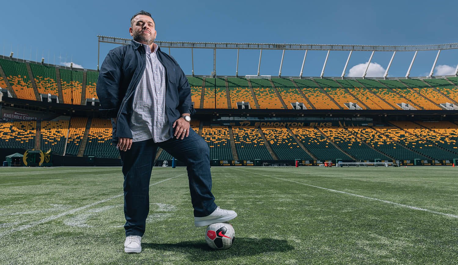 NedalHuoseh_Stadium_Standing_FootOnSoccerBall