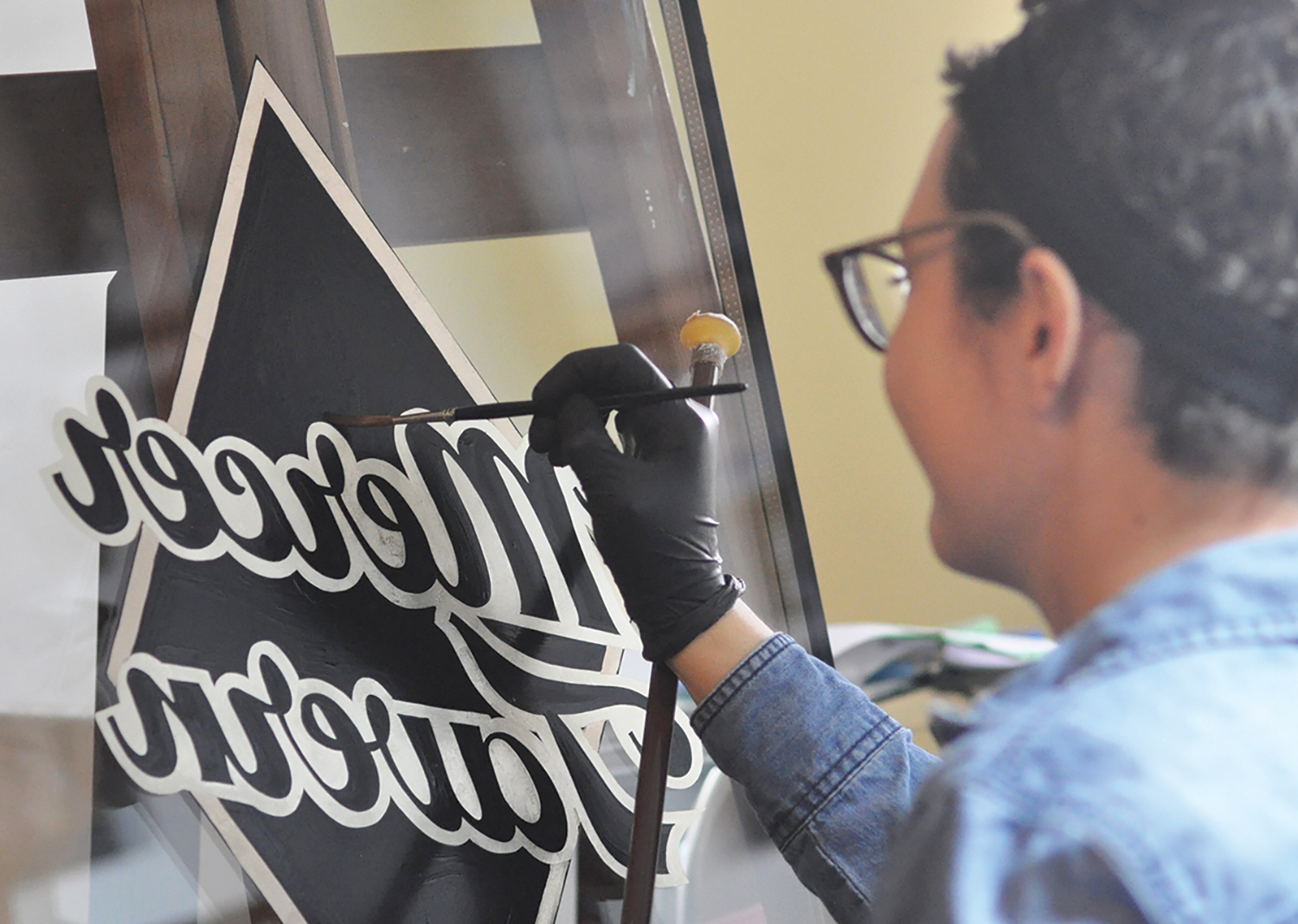 PaintingReverseMercerSignOnGlass