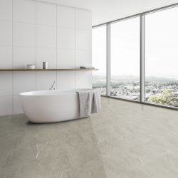 Panoramic white tile bathroom corner with tub