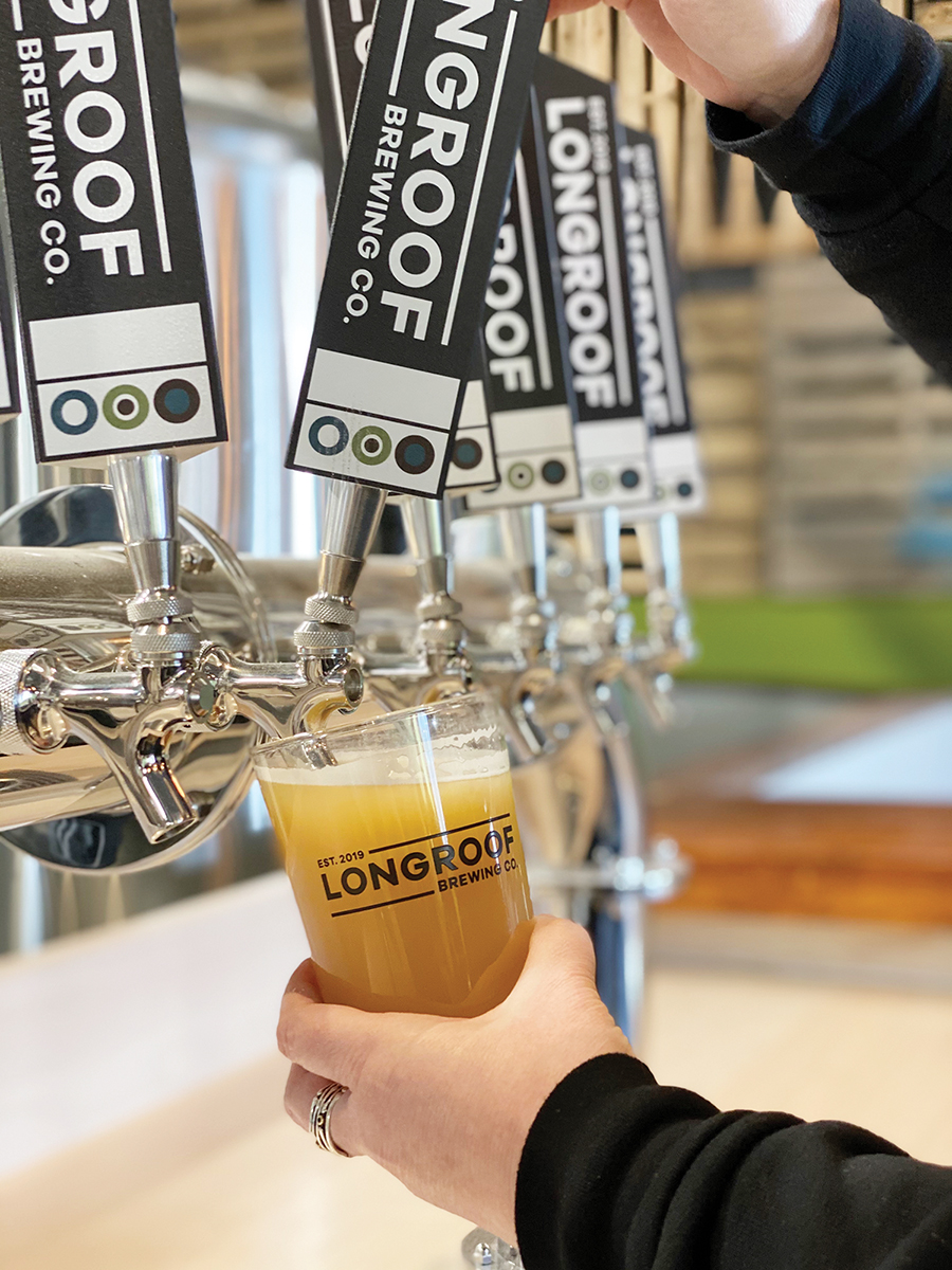 PullingLongRoofBeerIntoLongbrewGlass