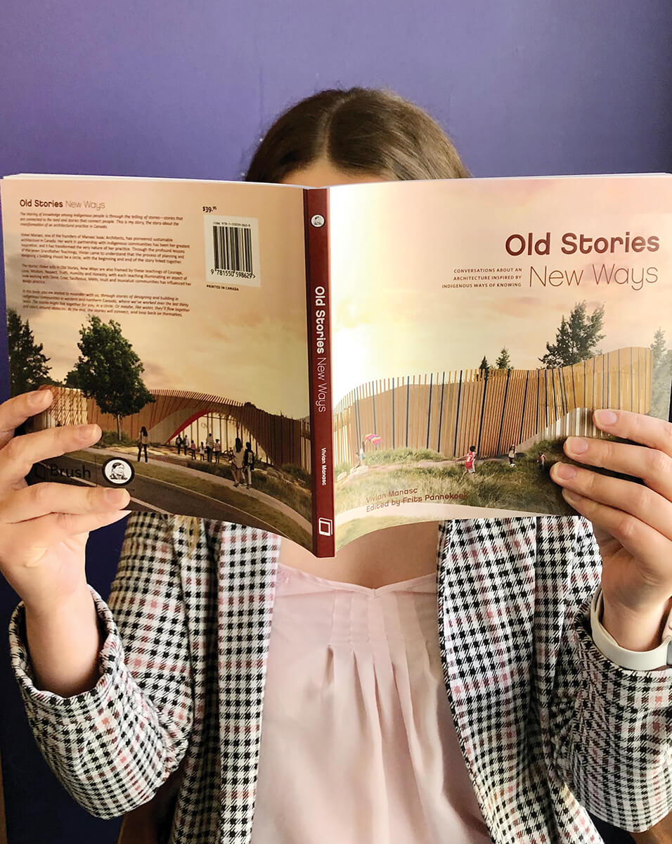 Stage_HoldingUpBook_OldStoriesNewWays