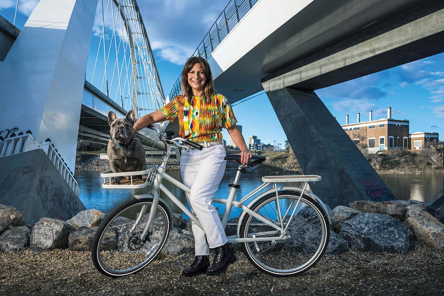 TraciBednard_OnBike_InFrontOfLowLevelBridge