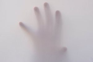 Ghostly Hand On White Screen
