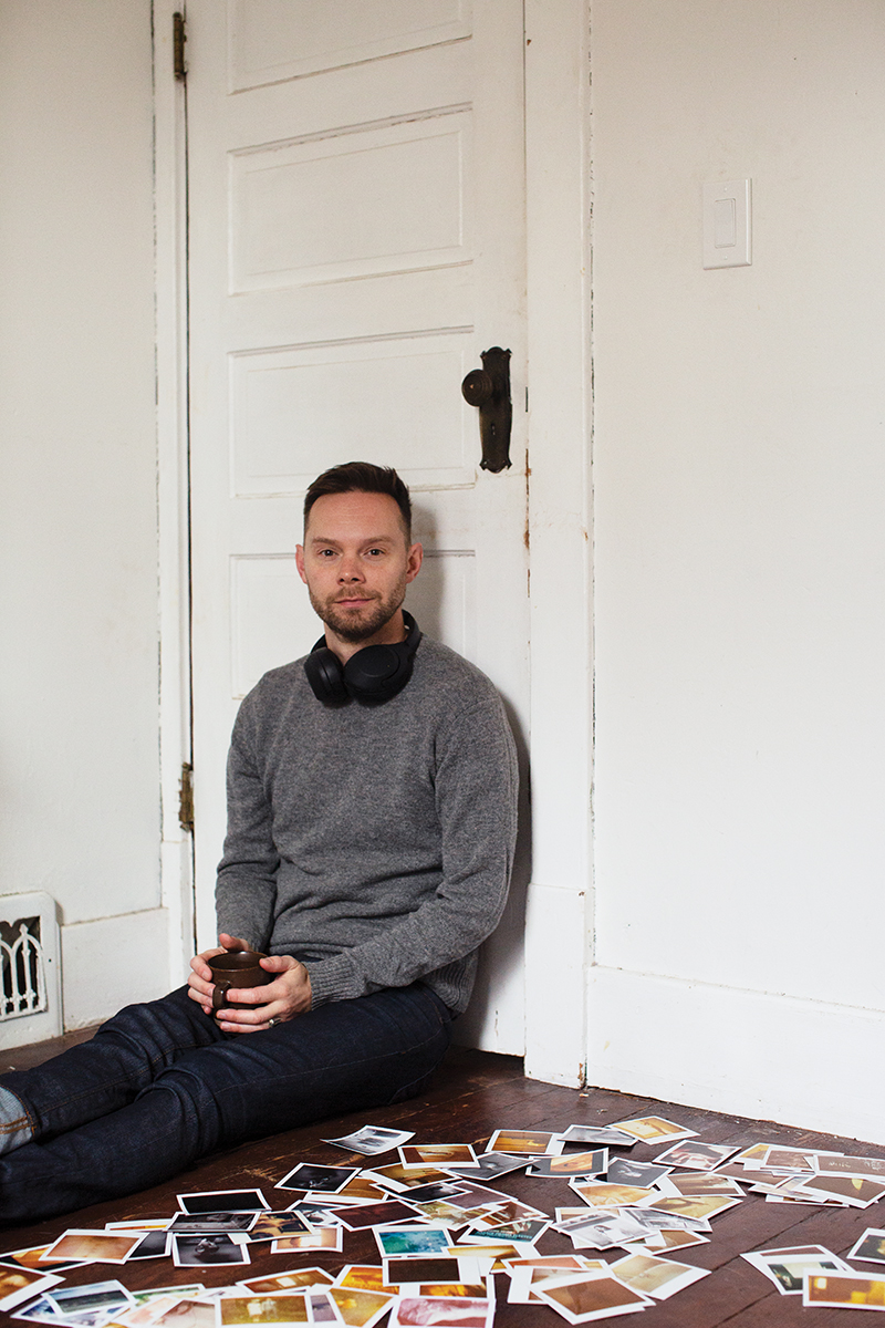 ZacharyAyotte_Man_SittingAgainstDoorOnFloor