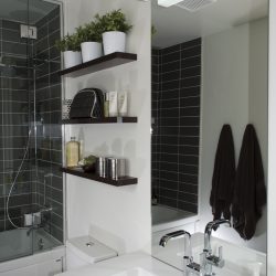 Planters from IKEA; floating shelves from Rona;  Metro Ceramic shower tiles from Julian Tile Edmonton; Laufen Pro dual flush toilet  and  Duravit sink from Cantu Bathrooms and Hardware; Grohe faucet from Allure