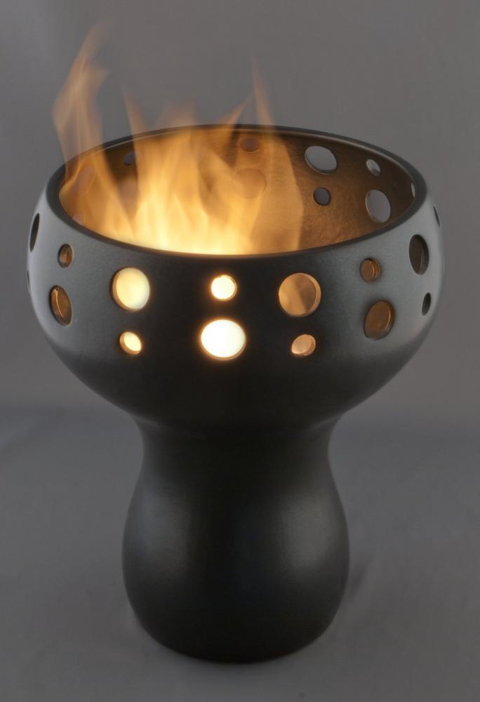 The Real Flame gel fuel ($9) in this matte black WestBrooke fireburner crackles, giving you both the beauty of modern comfort and the feeling of a campfire. It's $74 at Henry's Purveyor of Fine Things. (10216 124 St., 780-454-6660)