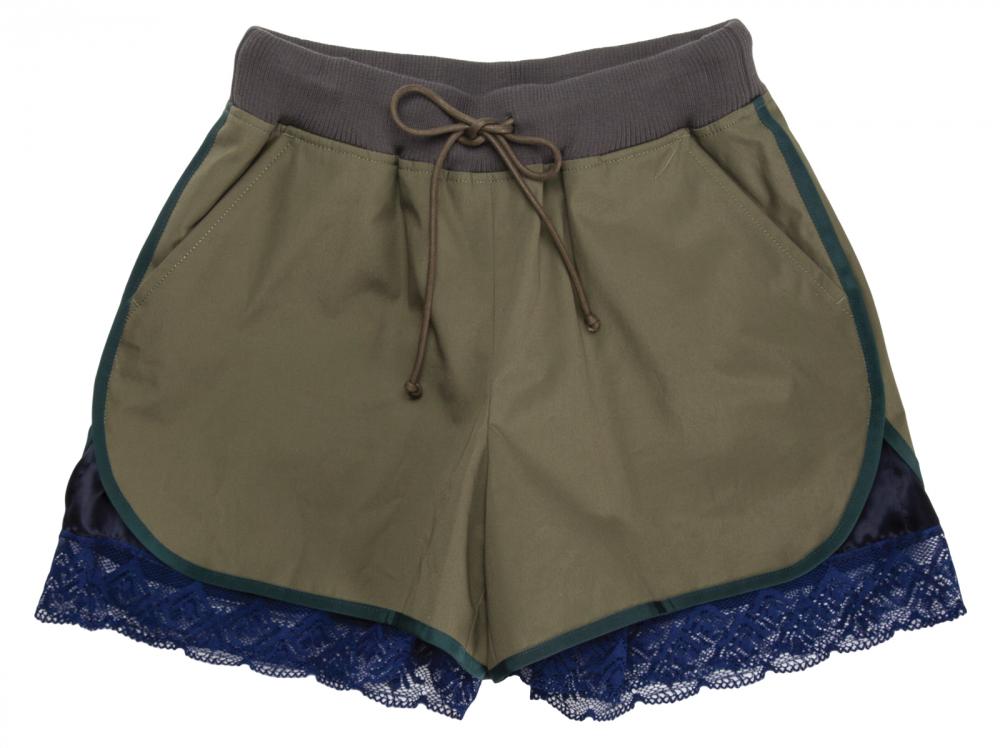 Sacai Luck running shorts with lace underlayer, $470, from Coup {Garment Boutique}. (10180 102 St., 780-756-4388)