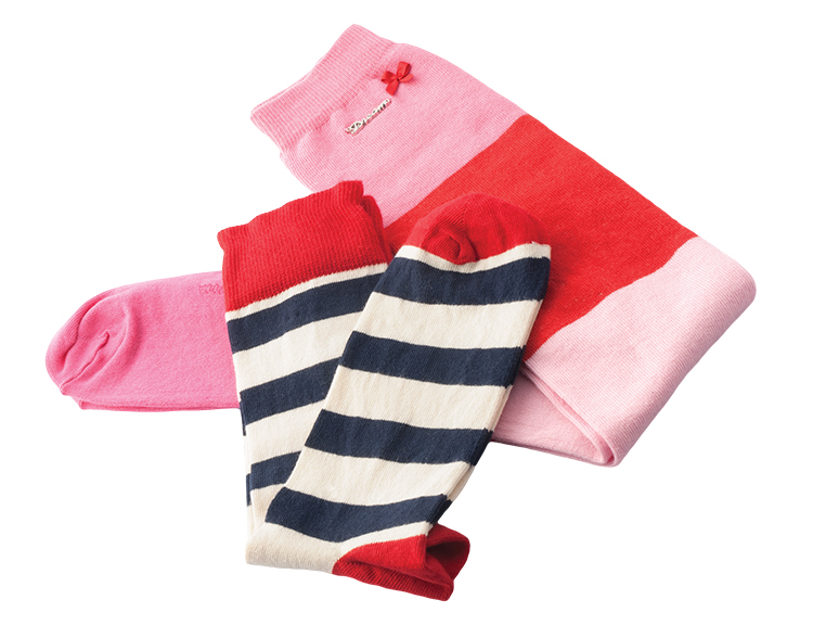  Pink and red knee high socks by Avoca, $35, and blue, white and red unisex socks by Happy Socks, $15, from Red Ribbon. (12505102 Ave., 780-454-4336)