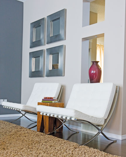 Above: The feature wall in the dining room set the tone for the rest of the home’s palette – neutral tints with pops of bright colours. Above: The feature wall in the dining room set the tone for the rest of the home’s palette – neutral tints with pops of bright colours.